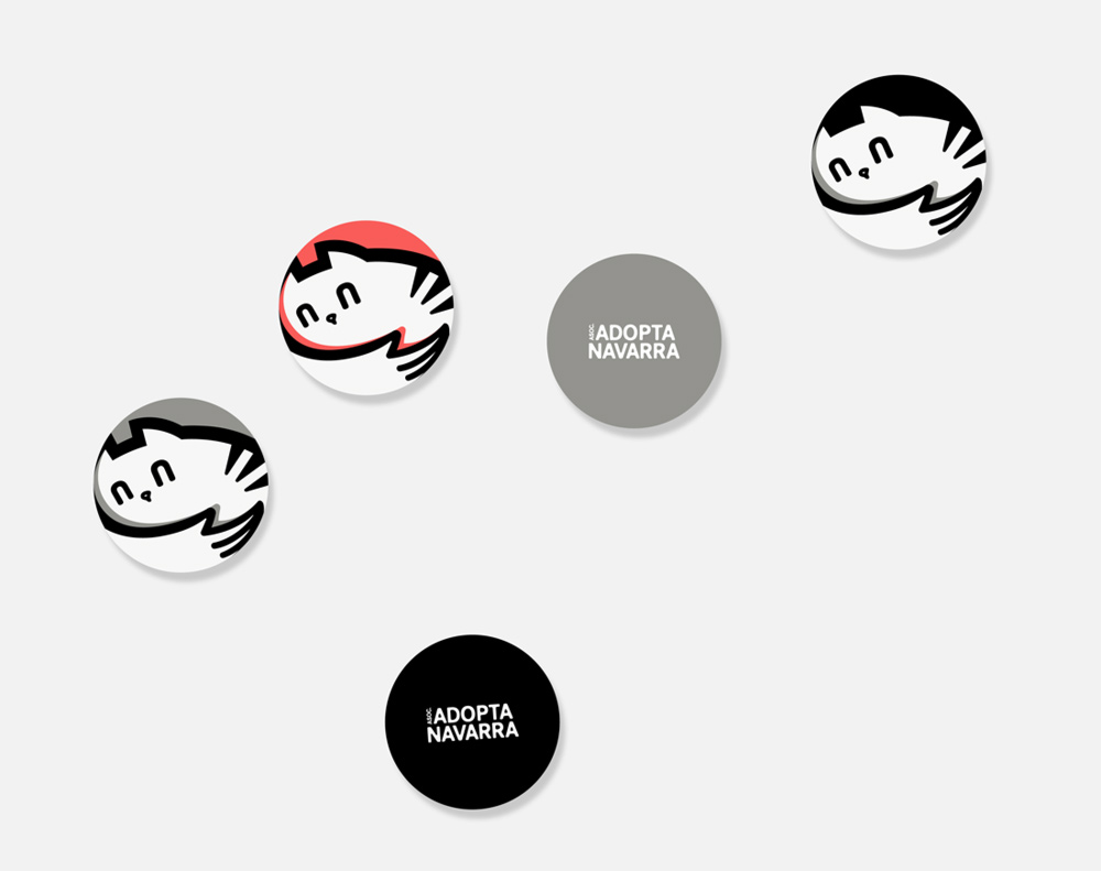 diseño de chapas para la asociación Adopta Navarra
